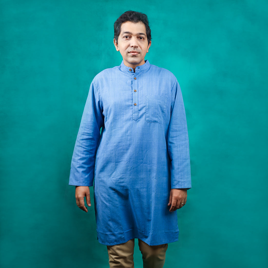 
                  
                    BLUE AND TEAL STRIPED LONG FULL SLEEVES KURTA WITH SHORT PLACKET AND WOOD BUTTONS
                  
                