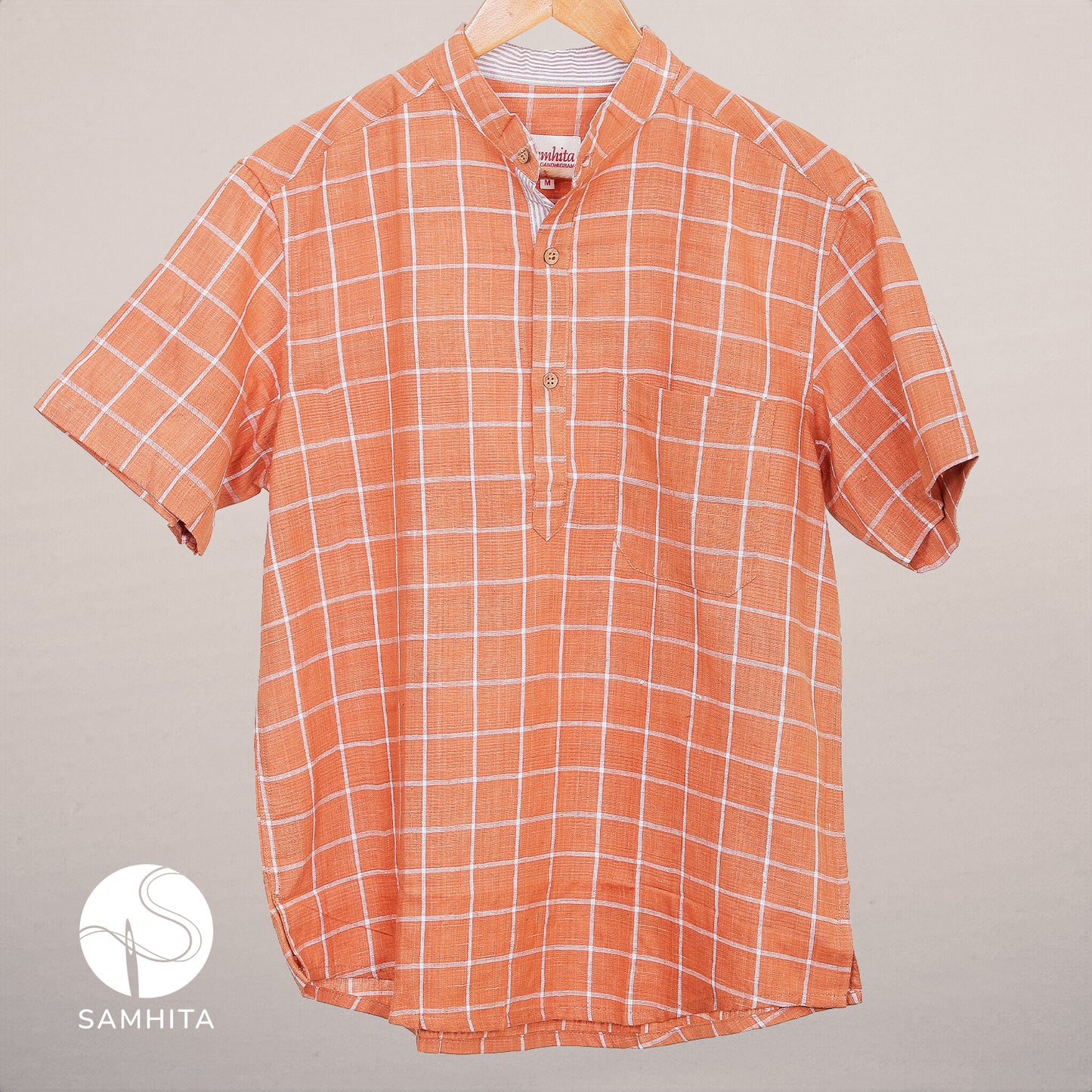 
                  
                    Men's Rust Orange Khadi Cotton Check Shirt with Half Sleeves Mandarin Collar and Wooden Button Detail (MK 101 A)
                  
                