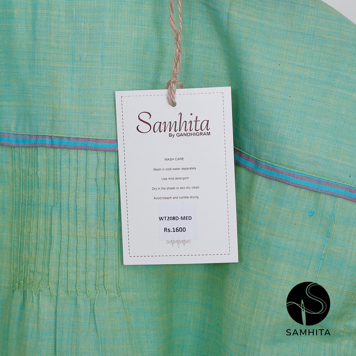 
                  
                    Blue-green pastel  top with cap sleeves and contrast detail in the center (WT208D)
                  
                
