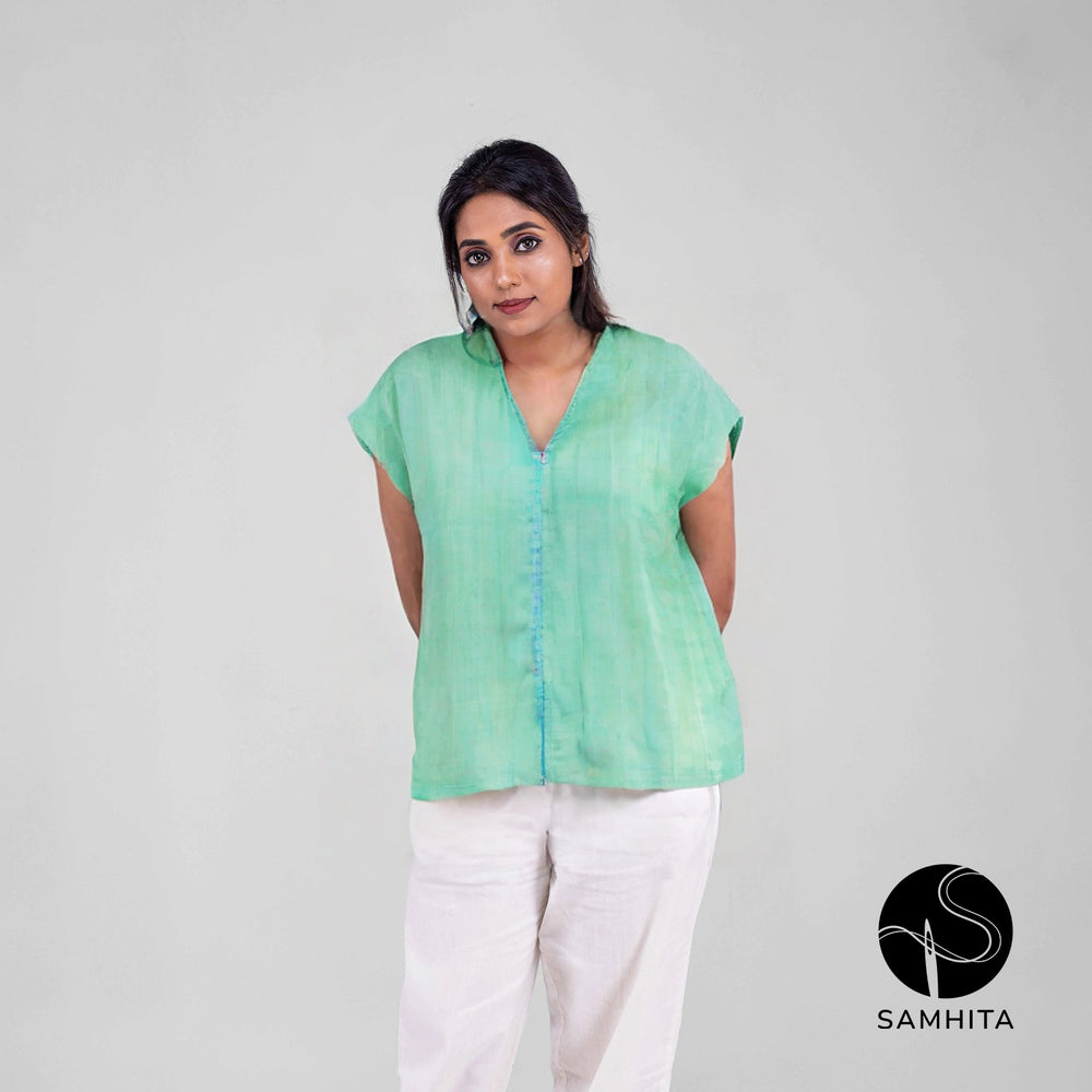 Blue-green pastel  top with cap sleeves and contrast detail in the center (WT208D)